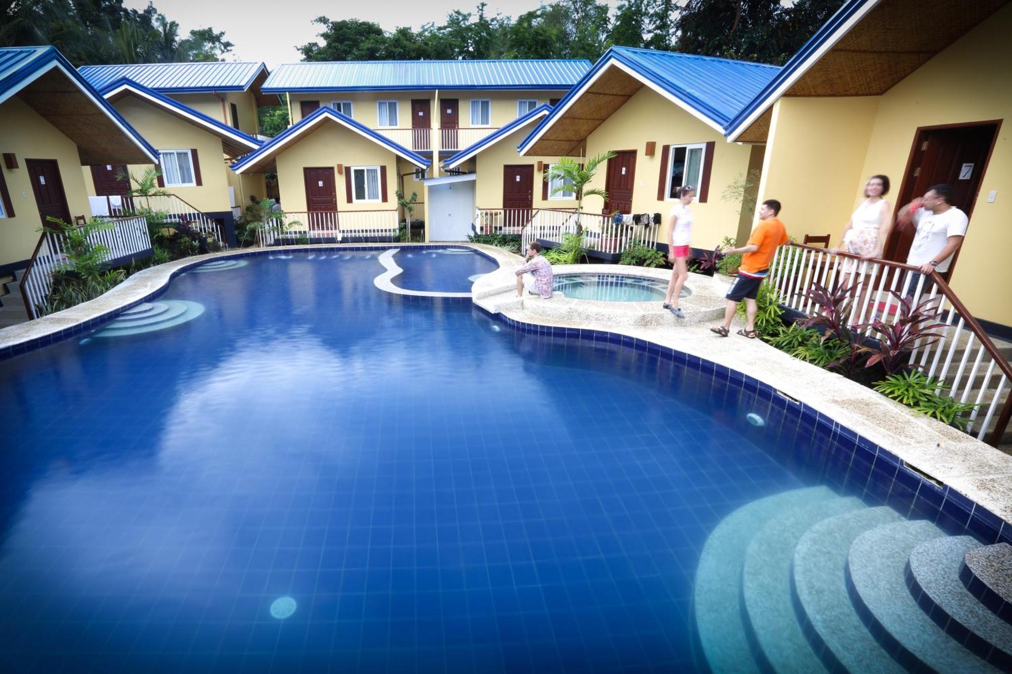 Blue Lagoon Inn & Suites Puerto Princesa Exteriör bild